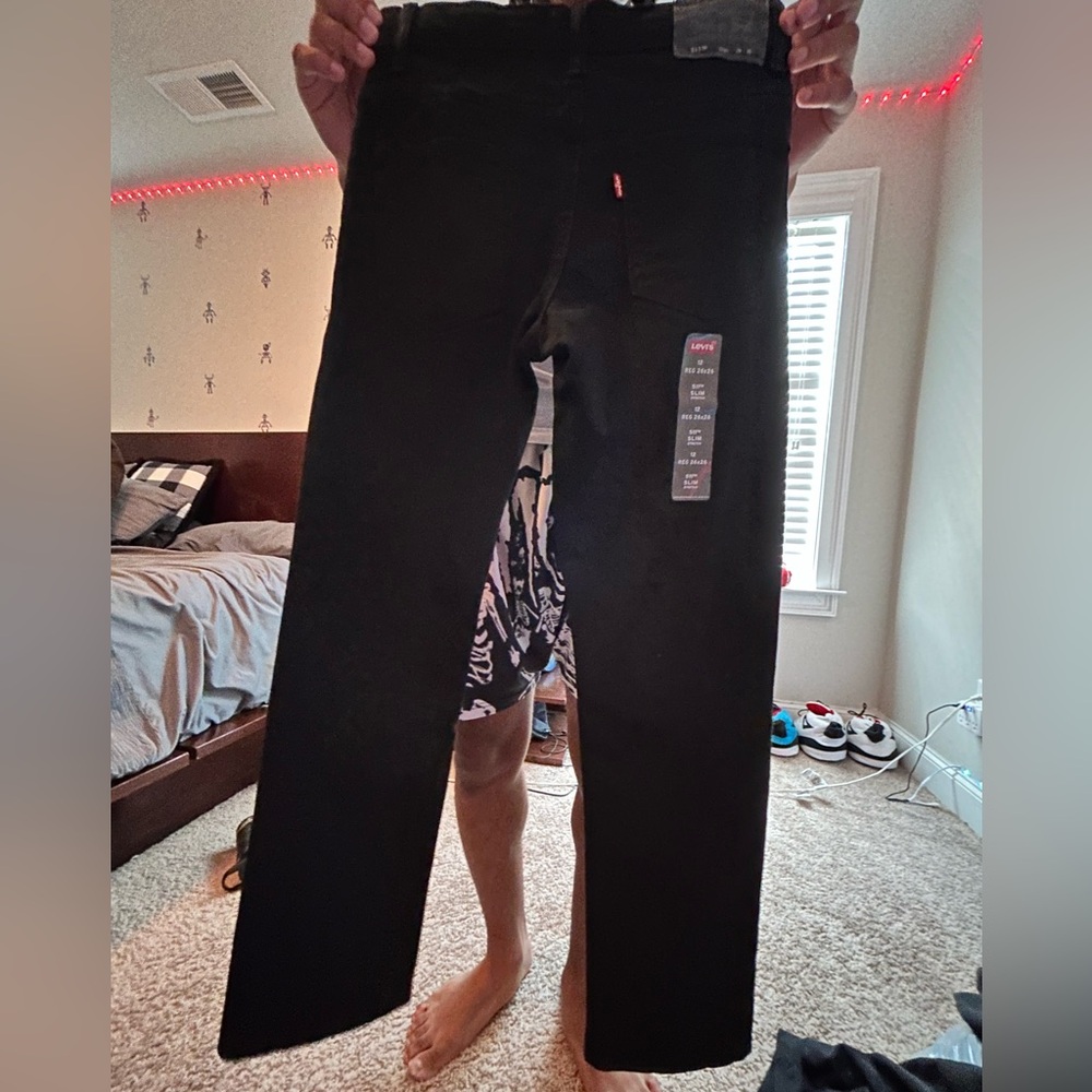 Black Levi’s jeans slim fit size 12 new